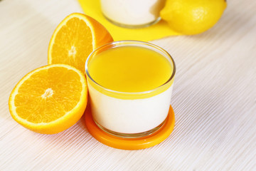 Food. Panna cotta. Italian milk citrus dessert made of yogurt and cream with lemon and orange.