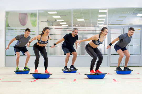 Exercising on bosu ball