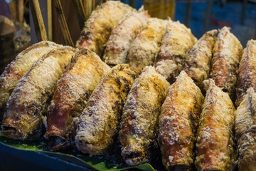 Fired fish with salt in night market