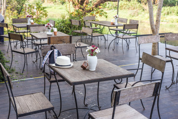 Empty cafe table with chair in vintge coffee shop