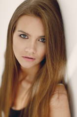 Naklejka premium closeup. face of a beautiful girl with long hair