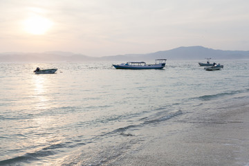 Boats in the Sunset at Lakey Peak