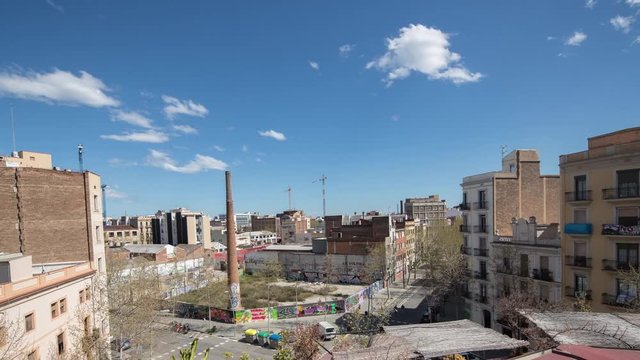 timelapse view of a street corner in the industrial neighbourthood of poblenou, barcelona