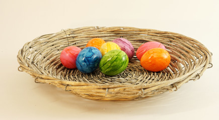 colorful easter eggs in basket