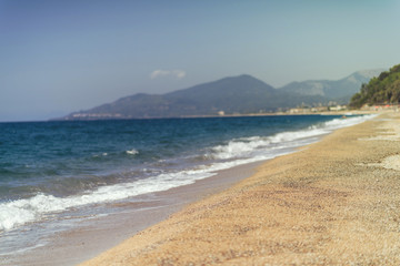 View on the tropical beach and boat on sunset.