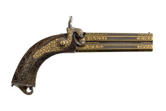 Vintage pistol with carving and engraving