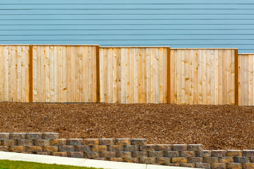 New Garden Wood Fence by House Exterior