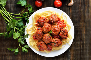 Meatballs and spaghetti on plate