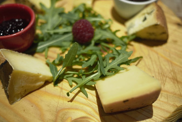 Assorted cheese plate with preserves