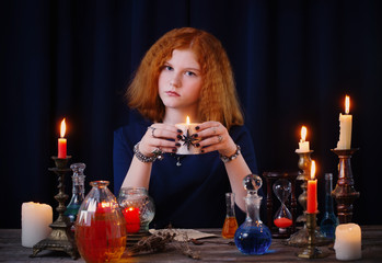  young witch is engaged in witchcraft