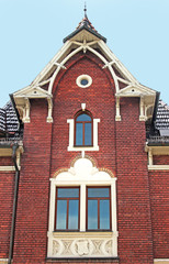 facade of a beautiful old brick stone house