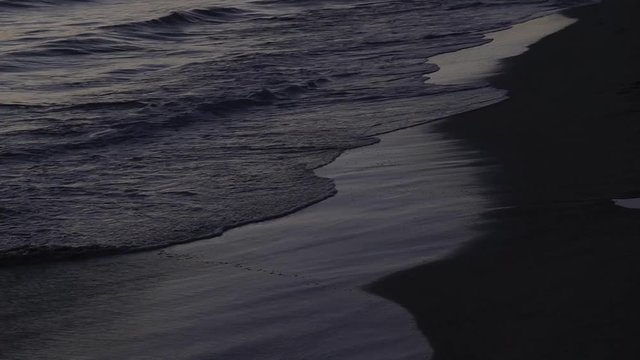 Wave in sunset. Close up