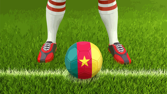 Man and soccer ball  with Cameroon flag 