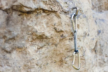 Wandcirkels Alpinisme Quickdraw on the rock.  © zhukovvvlad