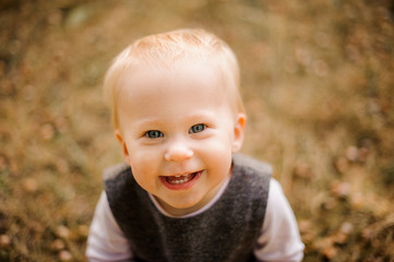 Portrait of a beautiful and cute smiling blonde baby