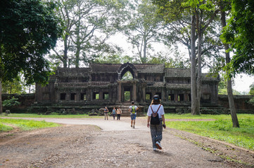 Fototapeta na wymiar Angkor Wat is an UNESCO World Heritage site since 1992. Famous for it`s construction process and carving murals. Attract visitors from all over the world to experience the mysterious country.