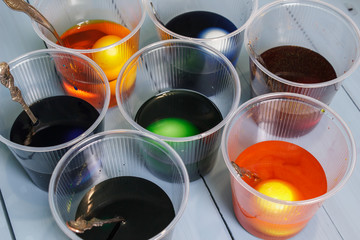 Glasses with paint for Easter eggs