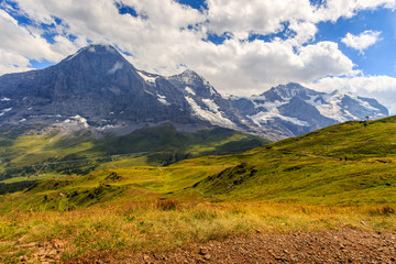Fototapeta na wymiar panoramic view on Eiger, Monch and Jungfrau in summer
