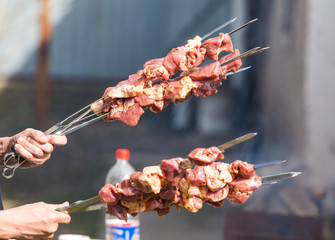 raw meat for barbecue on skewers