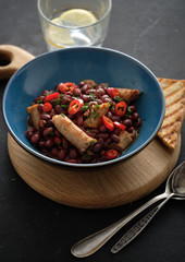 Red beans with sausages in a plate