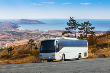 Fototapeta na wymiar Bus Rides on the Picturesque mountain highway