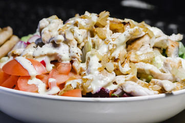 A turkey salad with salad cream