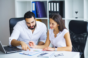 Group of young executives having a work meeting