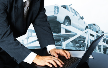 bussiness man working in office with New Cars in Stock. Car Dealership Cars For Sale background
