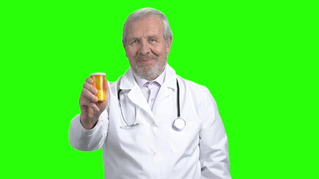 Physician recommend pills medical prescription to patient. Green screen hromakey background for keying.