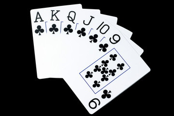 Playing cards on a black background, concept of grat and win