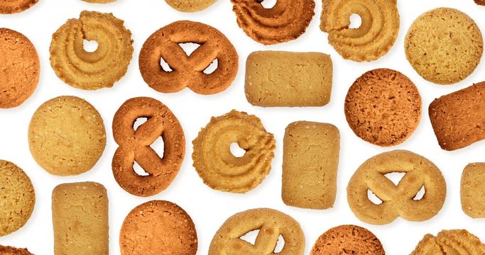 Butter Cookies in Assorted Shapes Vibrating against White Background