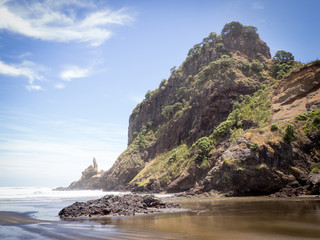 Beautiful Lion Rock on Piha Beach near Auckland in the North Island of New Zealand