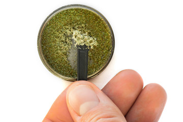 isolated Kief in grinder for weed macro Trichomes buds of Cannabis