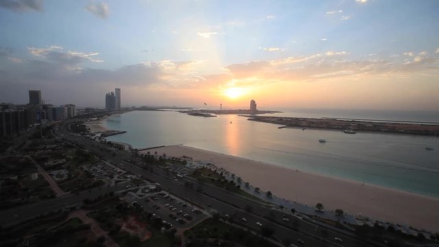 Abu Dhabi cityscape at sunset. Elevated view.