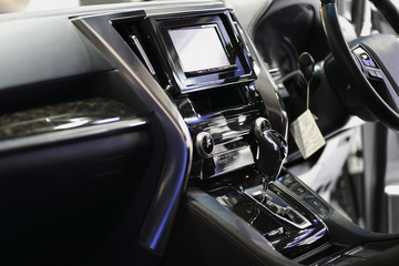 Automatic gear stick and front console in the Luxury car.