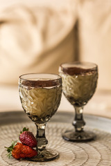 Two cups of tiramisu in elegant glass