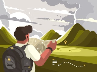 Traveler with map planning route to mountains
