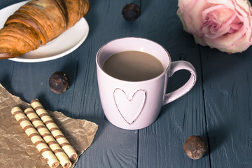Delicious chocolate dessert with cup of coffee