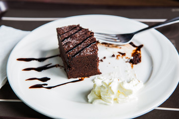 Brownies with chocolate sauce and whipped cream