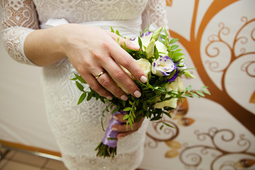 Bride hand with wedding ring