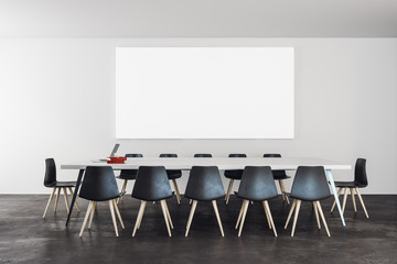 Modern conference room with poster