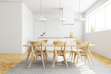 White kitchen and dining room interior