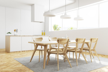 White kitchen and dining room corner