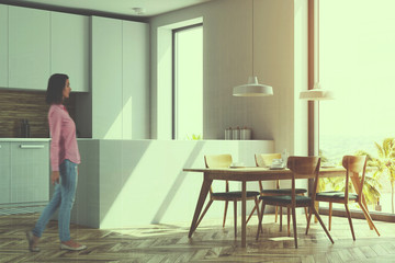 White and wooden kitchen, table, side view toned