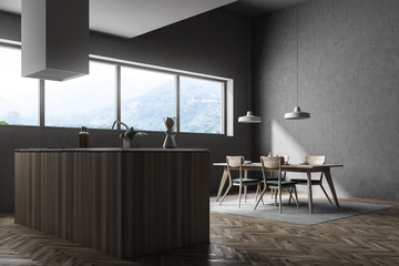 Gray kitchen and dining room, wooden counter
