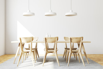 Fototapeta na wymiar White dining room interior, wooden chairs