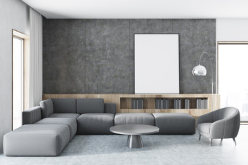 Concrete wall living room, gray sofa, poster