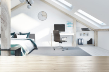 Attic bedroom and home office interior blur