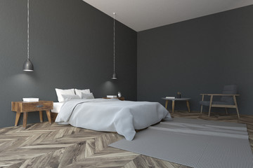 Corner of a modern gray bedroom interior