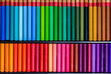 Macro of doublerow pencils, bright multicolored palette
